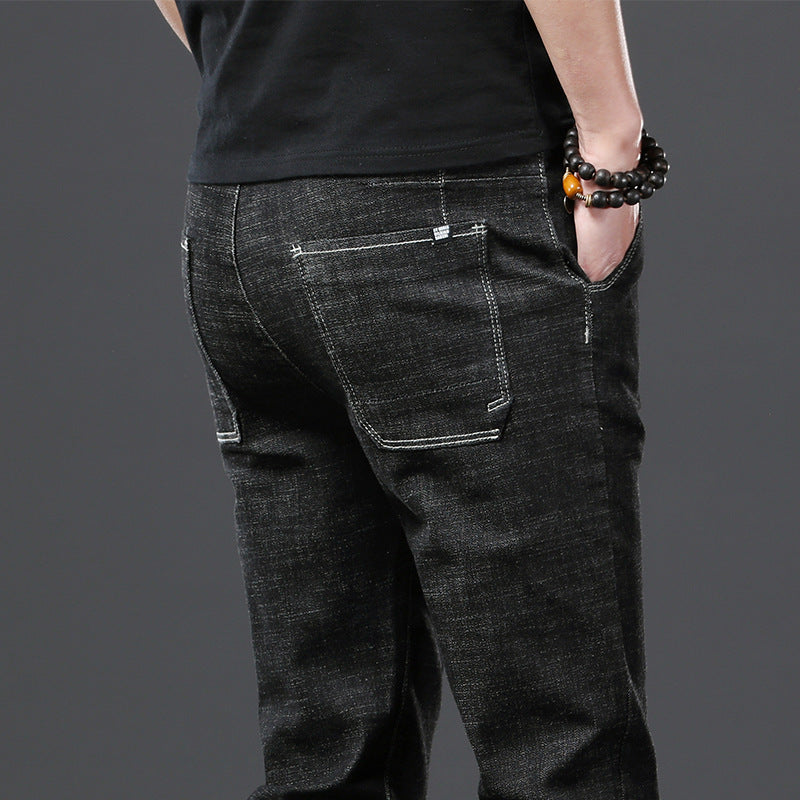 Stretch Loose Men Plus Flint Jeans Korean version popular logo slim skinny leg pants long pants black Haren pants