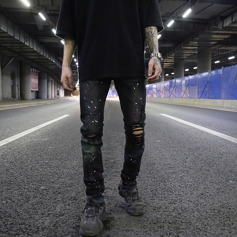 Slim-fit stretch-leg jeans with splashed graffiti